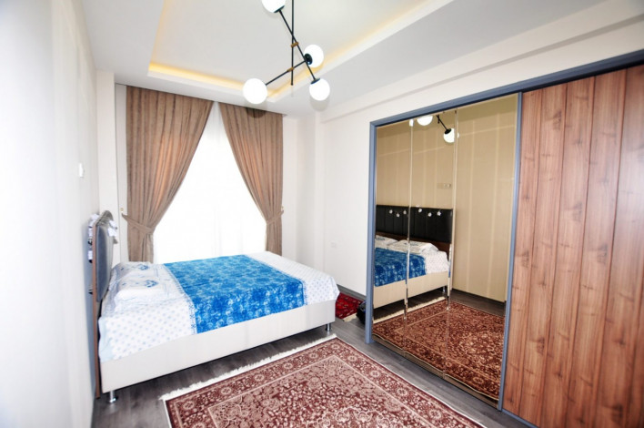 Трехкомнатная квартира c дизайнерским ремонтом в живописном районе Махмутлар, Алания, 115 м2 - Ракурс 33