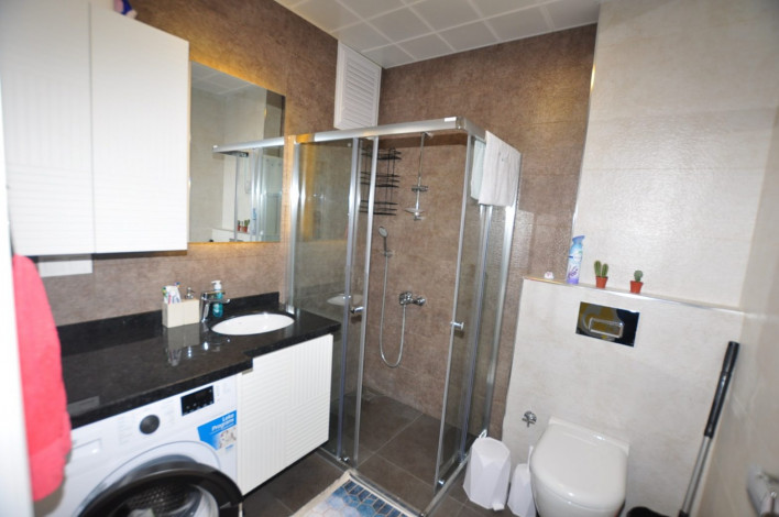 Трехкомнатная квартира c дизайнерским ремонтом в живописном районе Махмутлар, Алания, 115 м2 - Ракурс 36