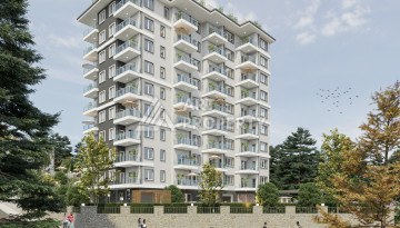 Новый проект жилого комплекса с апартаментами 1+1, 2+1, 3+1 в районе Авсаллар - Ракурс 1