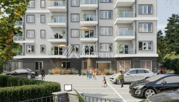 Новый проект жилого комплекса с апартаментами 1+1, 2+1, 3+1 в районе Авсаллар - Ракурс 32