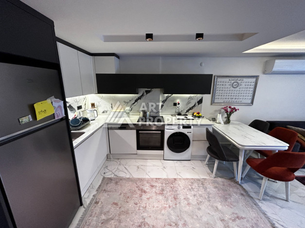 Квартира  1+1, 50м2 в хорошем комплексе, в шаговой доступности от моря. - Ракурс 2