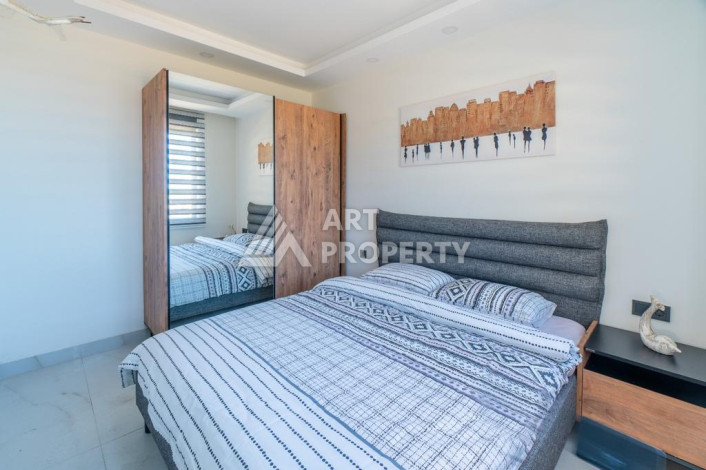 Квартира 1+1 с панорамным видом на море в новом доме в центральной части Алании - Ракурс 6