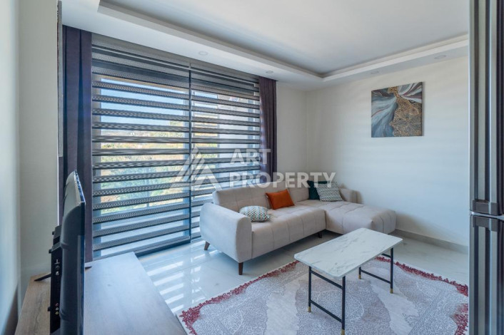 Квартира 1+1 с панорамным видом на море в новом доме в центральной части Алании - Ракурс 8