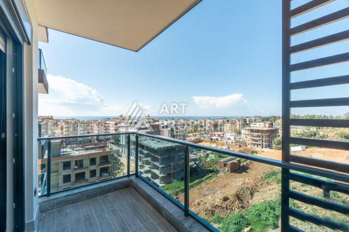 Квартира 1+1 с панорамным видом на море в новом доме в центральной части Алании - Ракурс 14