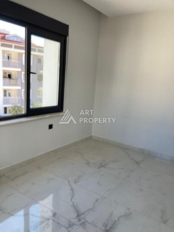 Апартаменты 1+1 в районе Оба с хорошей планировкой 67 м2! - Ракурс 3