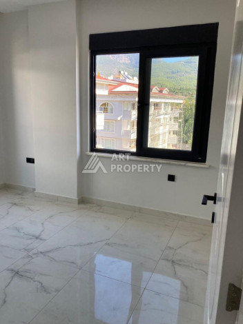 Апартаменты 1+1 в районе Оба с хорошей планировкой 67 м2! - Ракурс 4