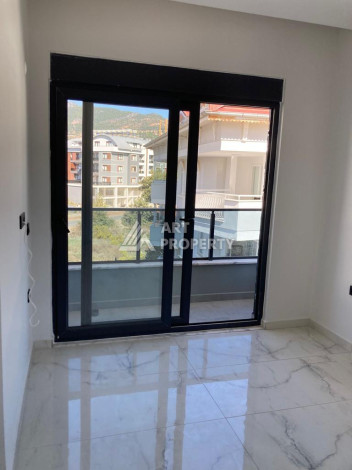 Апартаменты 1+1 в районе Оба с хорошей планировкой 67 м2! - Ракурс 14