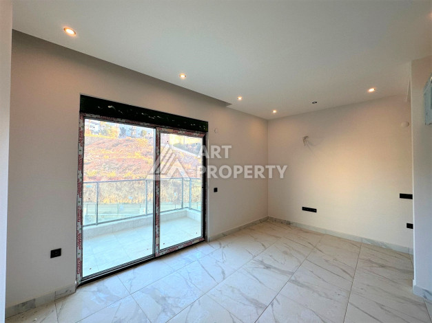 Новая квартира 1+1 с видом на горы и бассейн в районе Оба! - Ракурс 6