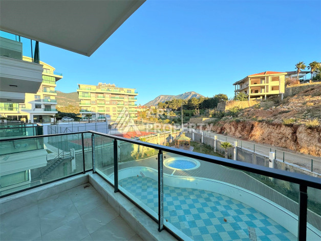 Новая квартира 1+1 с видом на горы и бассейн в районе Оба! - Ракурс 11