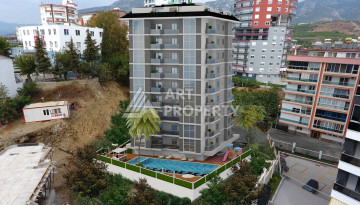 Квартира 1+1 в Махмутларе планировки 60 м2 в комплексе на завершающем этапе строительства! - Ракурс 10