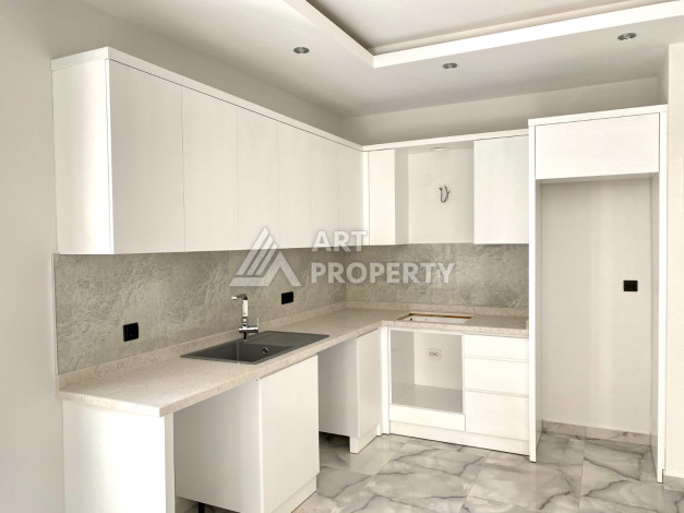 Квартира 1+1 в новостройке в самом центре Алании в 150 м от пляжа! - Ракурс 4