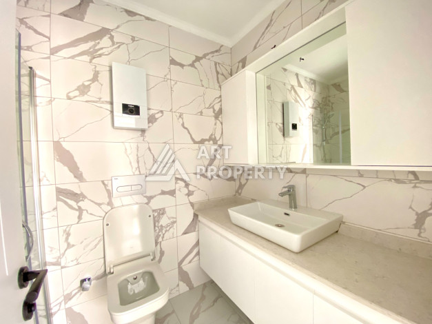 Квартира 1+1 в новостройке в самом центре Алании в 150 м от пляжа! - Ракурс 5