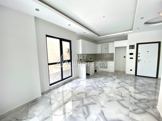 Квартира 1+1 в новостройке в самом центре Алании в 150 м от пляжа! - Ракурс 6