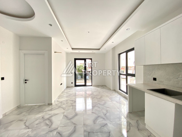 Квартира 1+1 в новостройке в самом центре Алании в 150 м от пляжа! - Ракурс 9