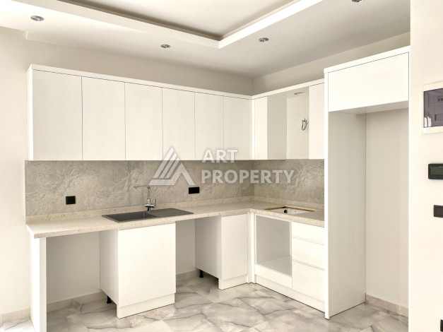 Квартира 1+1 в новостройке в самом центре Алании в 150 м от пляжа! - Ракурс 10