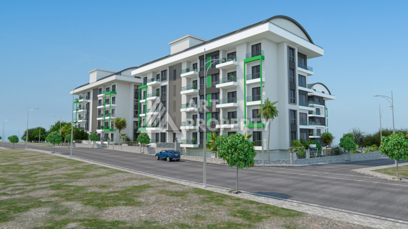 Комплекс на этапе строительства от ведущего застройщика Алании в районе Каргыджак! - Ракурс 3