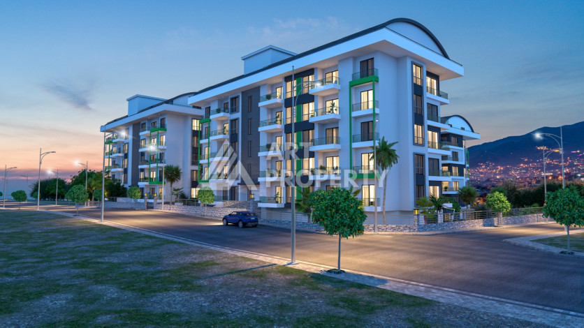 Комплекс на этапе строительства от ведущего застройщика Алании в районе Каргыджак! - Ракурс 4