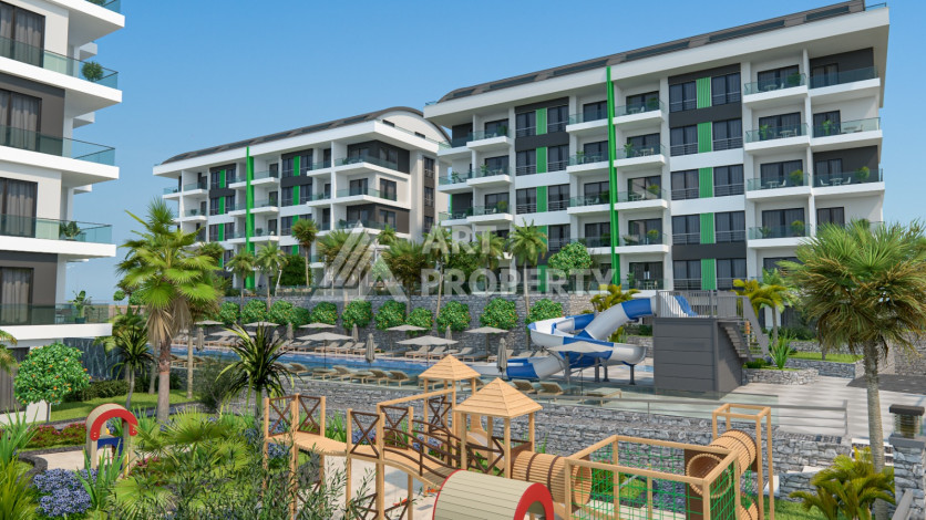 Комплекс на этапе строительства от ведущего застройщика Алании в районе Каргыджак! - Ракурс 5