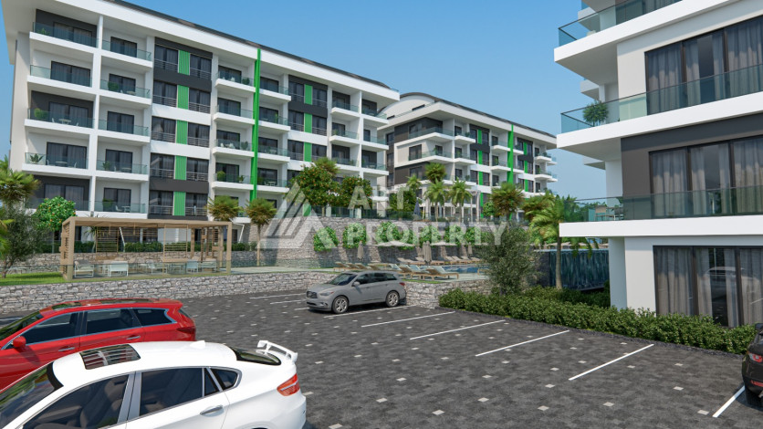 Комплекс на этапе строительства от ведущего застройщика Алании в районе Каргыджак! - Ракурс 6