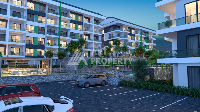 Комплекс на этапе строительства от ведущего застройщика Алании в районе Каргыджак! - Ракурс 9