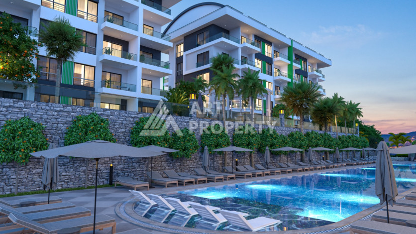 Комплекс на этапе строительства от ведущего застройщика Алании в районе Каргыджак! - Ракурс 11