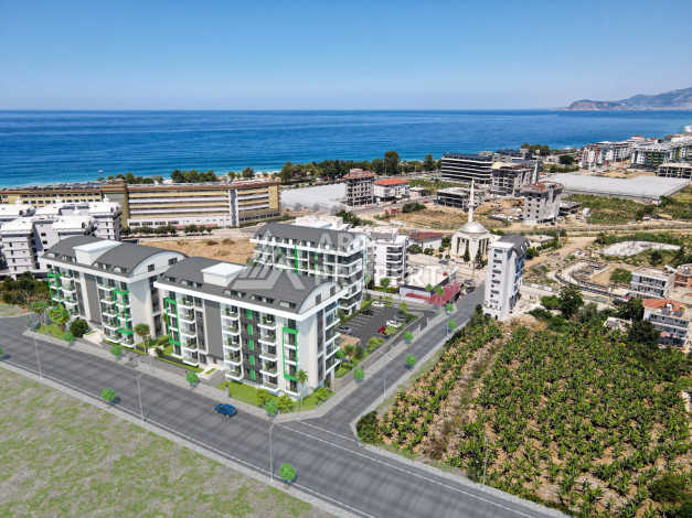 Комплекс на этапе строительства от ведущего застройщика Алании в районе Каргыджак! - Ракурс 13