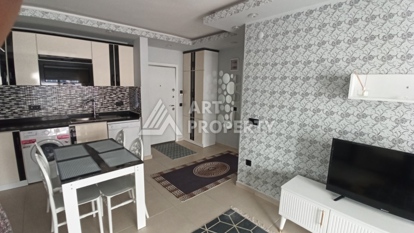 Квартира 1+1 с мебелью и техникой в центральной части Махмутлара! - Ракурс 12