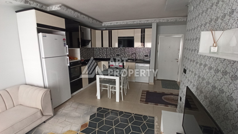 Квартира 1+1 с мебелью и техникой в центральной части Махмутлара! - Ракурс 14