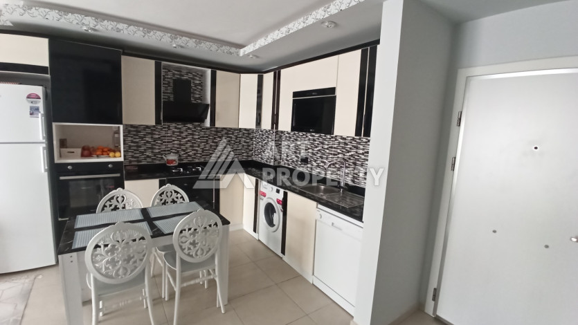 Квартира 1+1 с мебелью и техникой в центральной части Махмутлара! - Ракурс 17