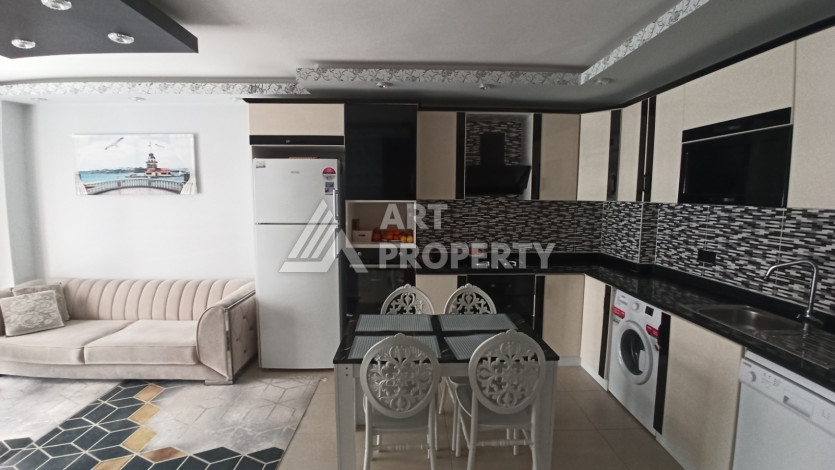 Квартира 1+1 с мебелью и техникой в центральной части Махмутлара! - Ракурс 18