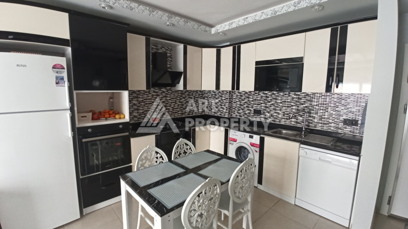 Квартира 1+1 с мебелью и техникой в центральной части Махмутлара! - Ракурс 20