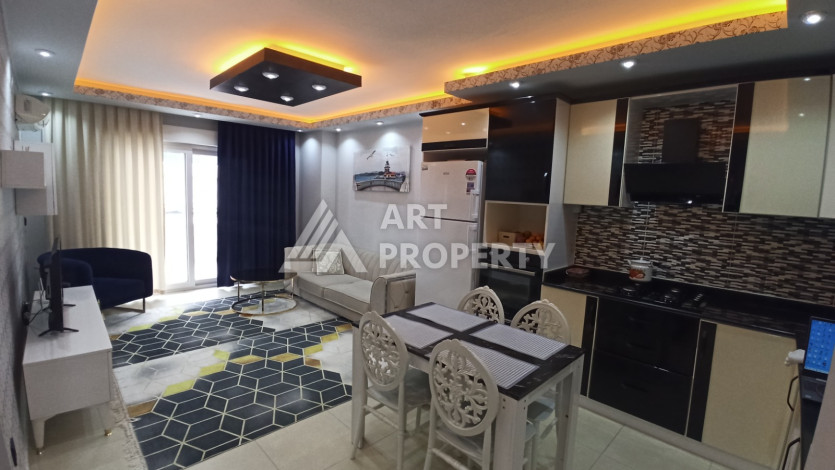 Квартира 1+1 с мебелью и техникой в центральной части Махмутлара! - Ракурс 22