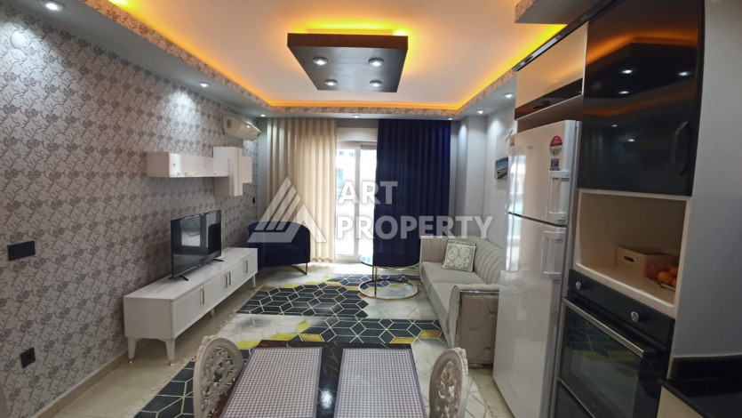 Квартира 1+1 с мебелью и техникой в центральной части Махмутлара! - Ракурс 25