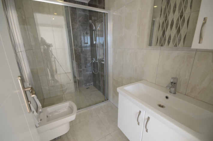 Двухуровневая квартира планировки 2+1 с видом на море в Кестель, Алания, 120 м2 - Ракурс 13