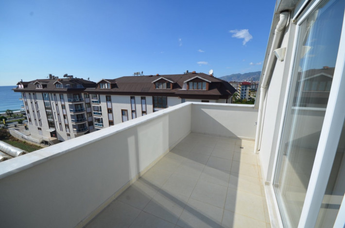 Двухуровневая квартира планировки 2+1 с видом на море в Кестель, Алания, 120 м2 - Ракурс 17