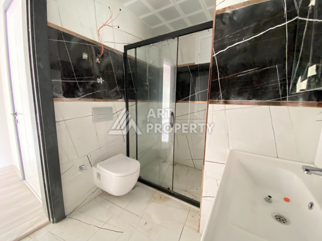 Квартира 2+1 с отдельной кухней в новостройке в центральной части Алании! - Ракурс 7