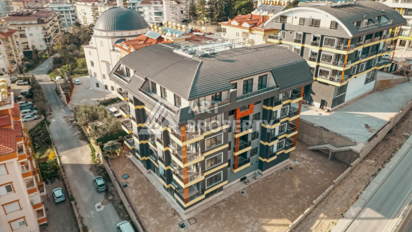 Квартира 2+1 с отдельной кухней в новостройке в центральной части Алании! - Ракурс 12