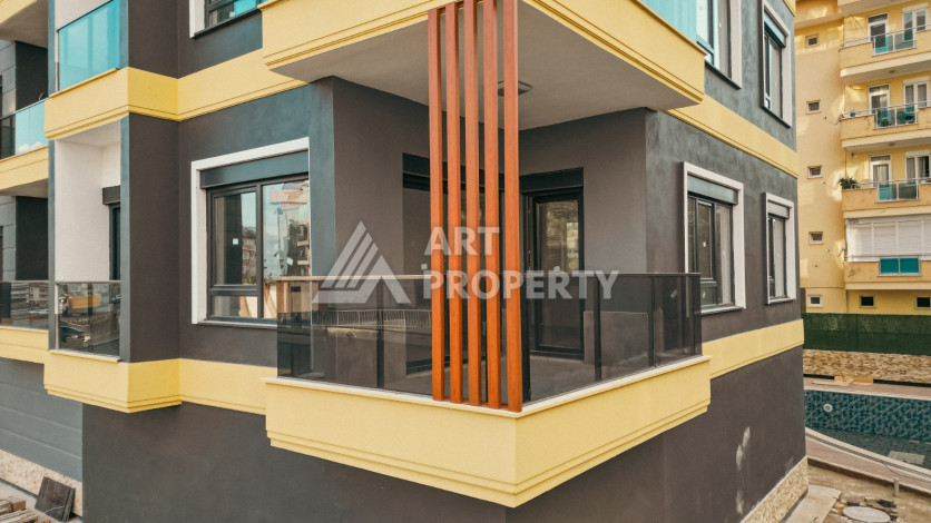 Квартира 2+1 с отдельной кухней в новостройке в центральной части Алании! - Ракурс 14