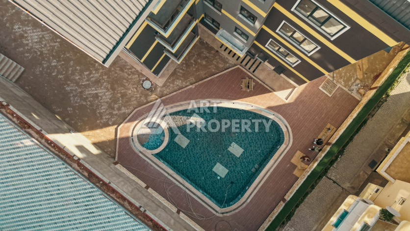 Квартира 2+1 с отдельной кухней в новостройке в центральной части Алании! - Ракурс 15