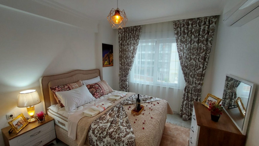 Меблированные апартаменты  планировки 1+1 в 150 метрах от Средиземного моря в районе Кестель, Алания,65 м2 - Ракурс 14