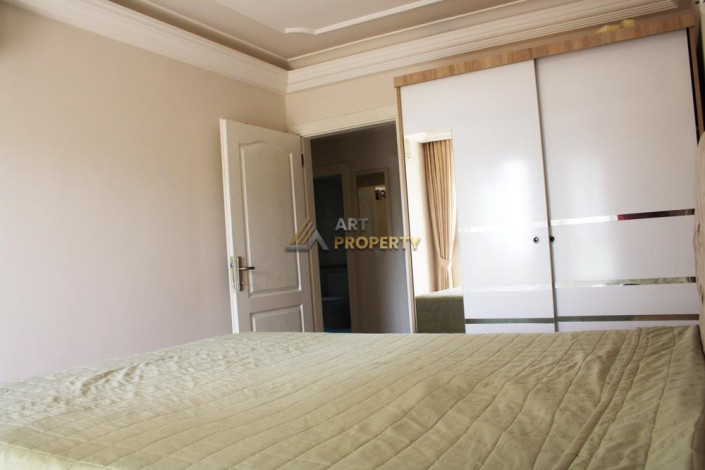 Трехкомнатная квартира с видом на море и горы в районе Кестель,Алания 105 м2 - Ракурс 6