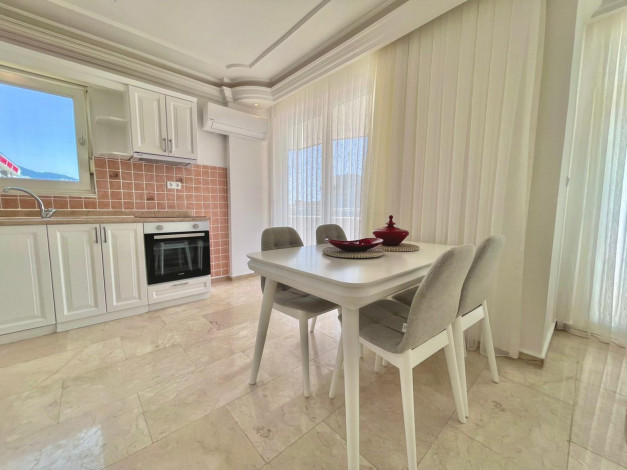 Меблированные апартаменты планировкой 2+1 в 100 метрах от Средиземного моря в районе Махмутлар, Алания, 125 м2 - Ракурс 2