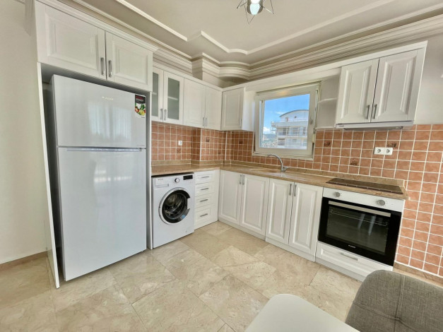 Меблированные апартаменты планировкой 2+1 в 100 метрах от Средиземного моря в районе Махмутлар, Алания, 125 м2 - Ракурс 3