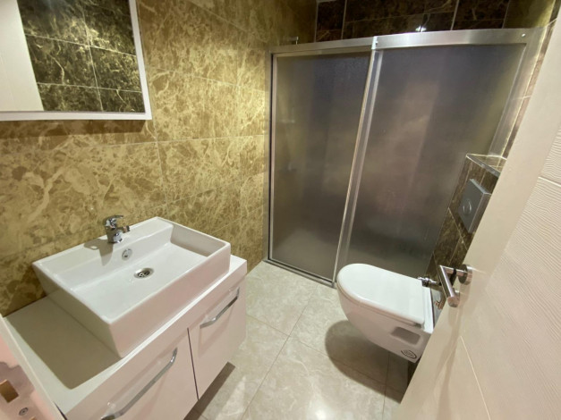 Шикарная квартира с красивым видом на старинный город Наулу в Махмутларе, Алания, 110 м2 - Ракурс 9