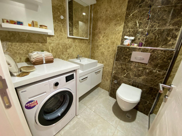 Шикарная квартира с красивым видом на старинный город Наулу в Махмутларе, Алания, 110 м2 - Ракурс 18