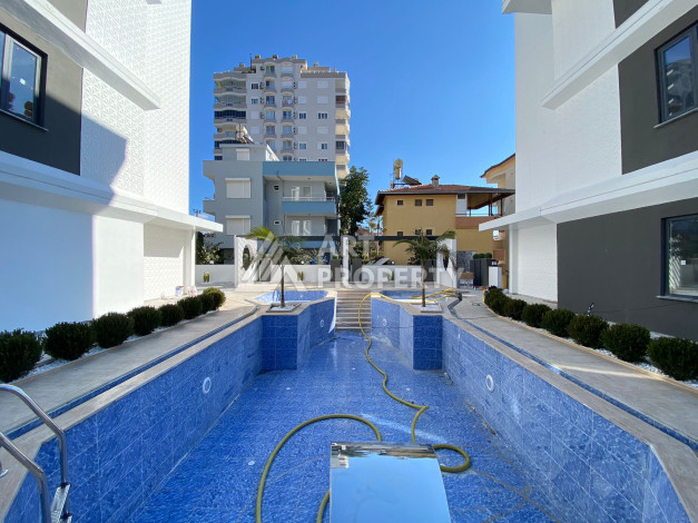 Ниже цены не найдете квартиры 1+1 в Махмутлар - Ракурс 7