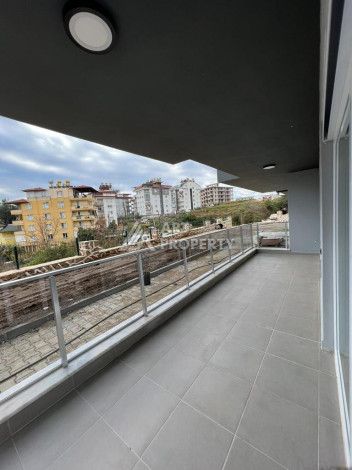 Новые апартаменты 3+1 в самом развитом районе Алании Оба - Ракурс 10